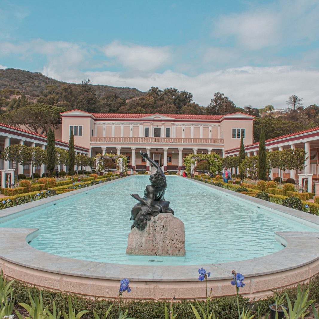 black statue on swimming pool